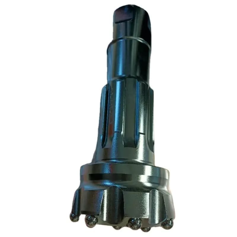 A Down-The-Hole drill bit drilling into rock