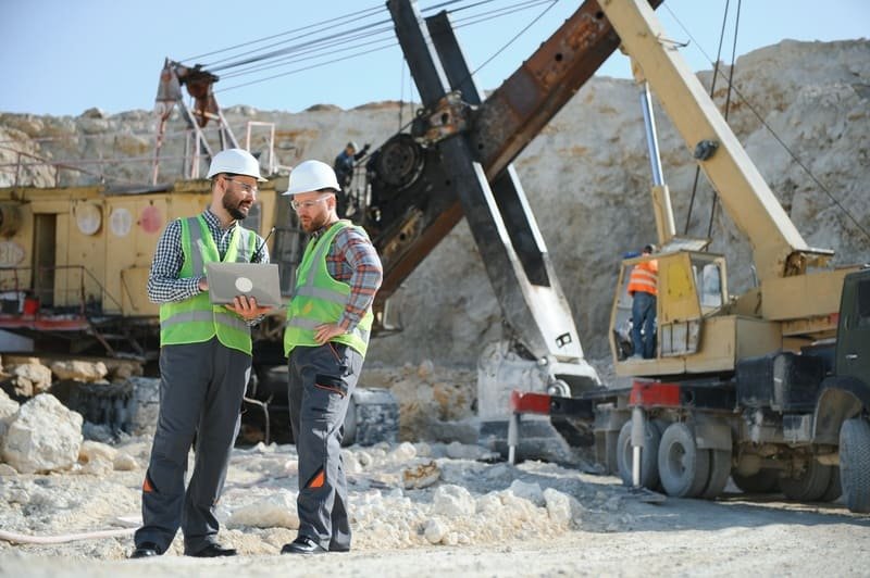 Close-up of a DTH drilling rig in operation