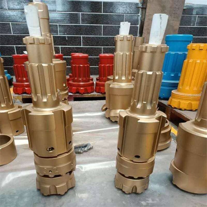Lubricated DTH drill bit showing smooth and shiny surfaces