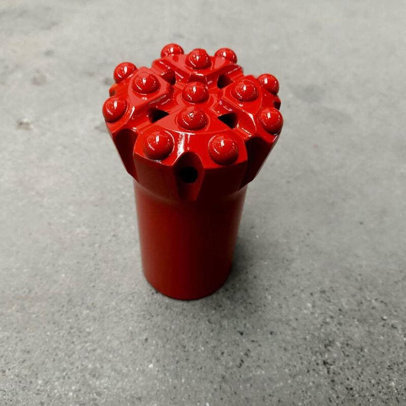 Close-up of a drilling button bit