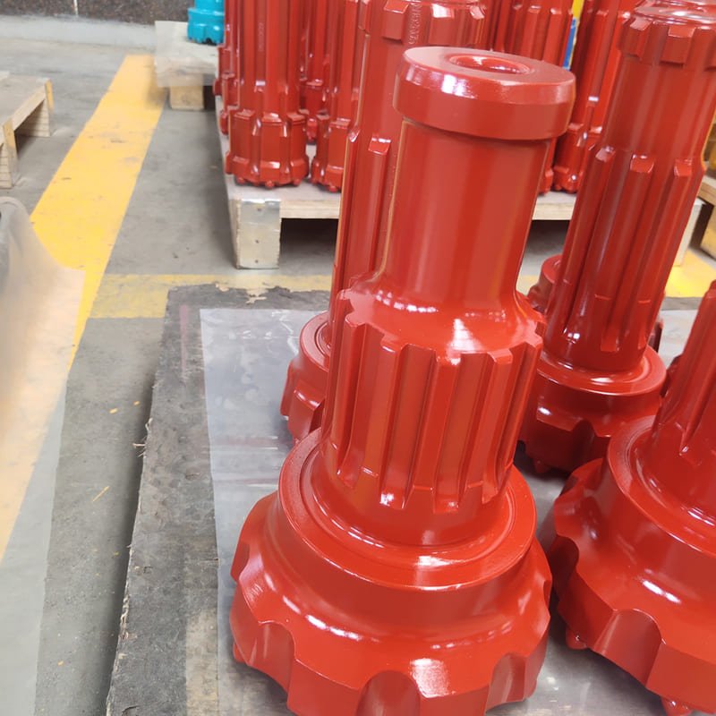 DTH drill bit in action at a mining site