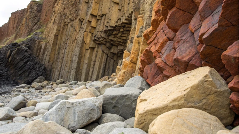 Detailed view of rock formations with various textures and colors