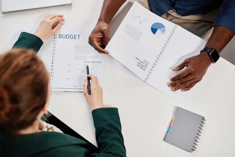 A visual representation of various budget strategies, including charts and graphs illustrating financial planning techniques.