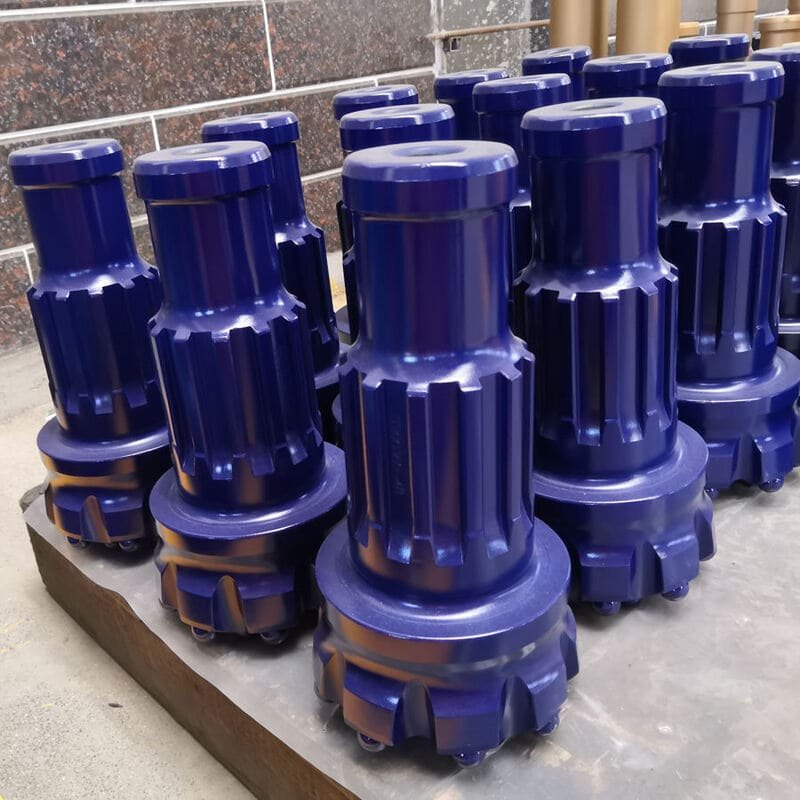 Blue DTH drill bits designed for efficient drilling in various geological conditions, showcasing durability and precision.