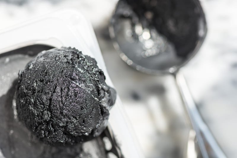 A close-up view of a diamond-like carbon coating, showcasing its smooth, reflective surface and durability.