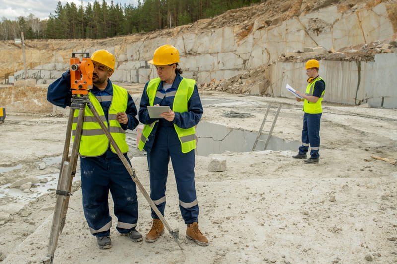 Image of geotechnical testing equipment analyzing soil samples for construction and engineering projects.
