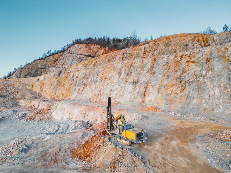 Industrial drilling machine operating on a construction site
