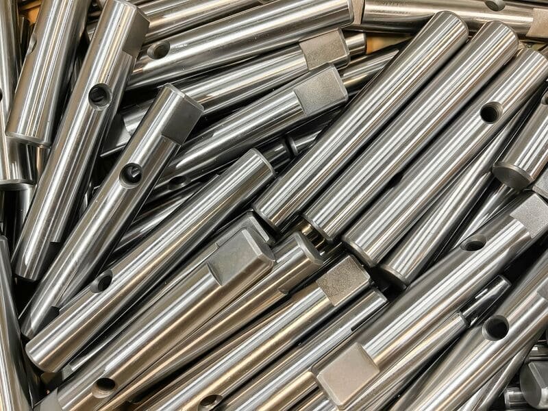 A close-up view of a nickel-coated layer, showcasing its shiny, metallic surface and smooth texture.