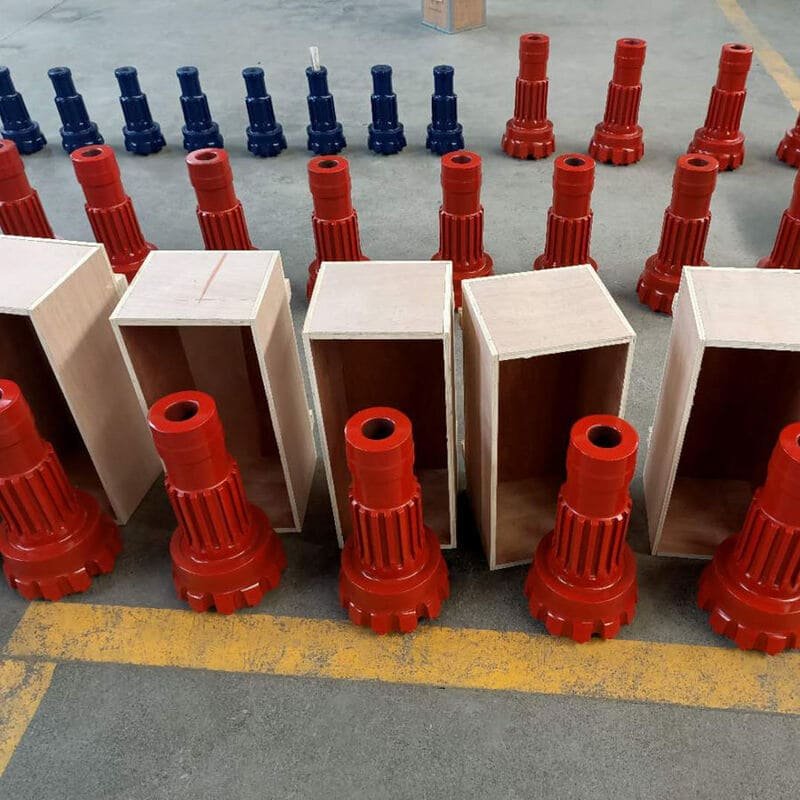 A package containing DTH drill bits prepared for sea shipment, showcasing robust packaging and labeling for transport.
