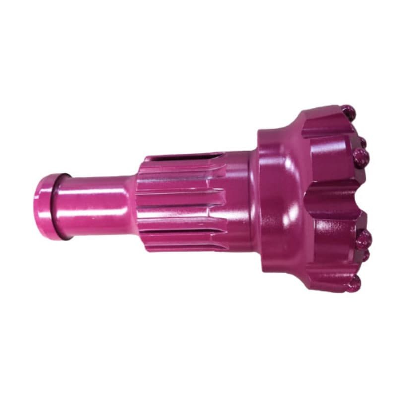 A purple DTH drill bit designed for efficient drilling in various geological conditions.