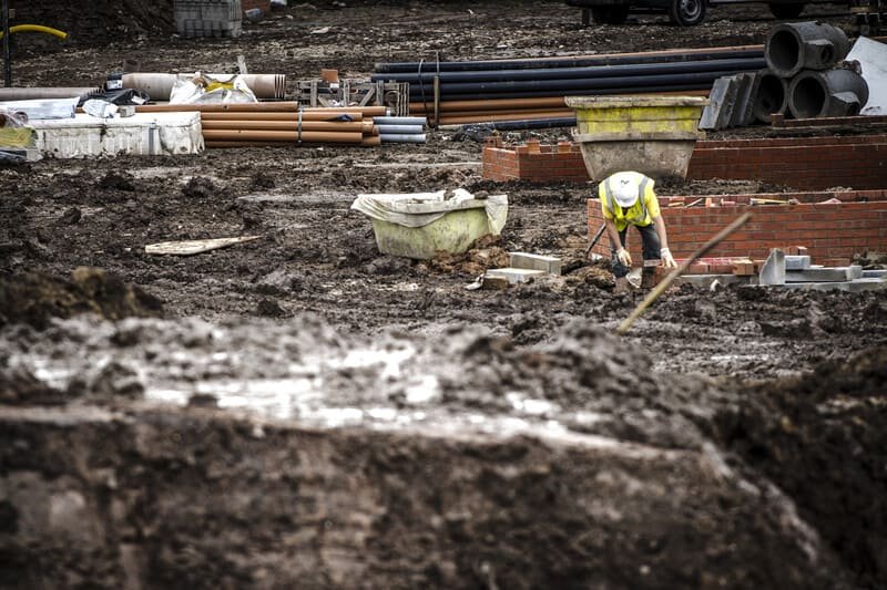 A team collaborates on remediation projects, focusing on environmental restoration and sustainability efforts.